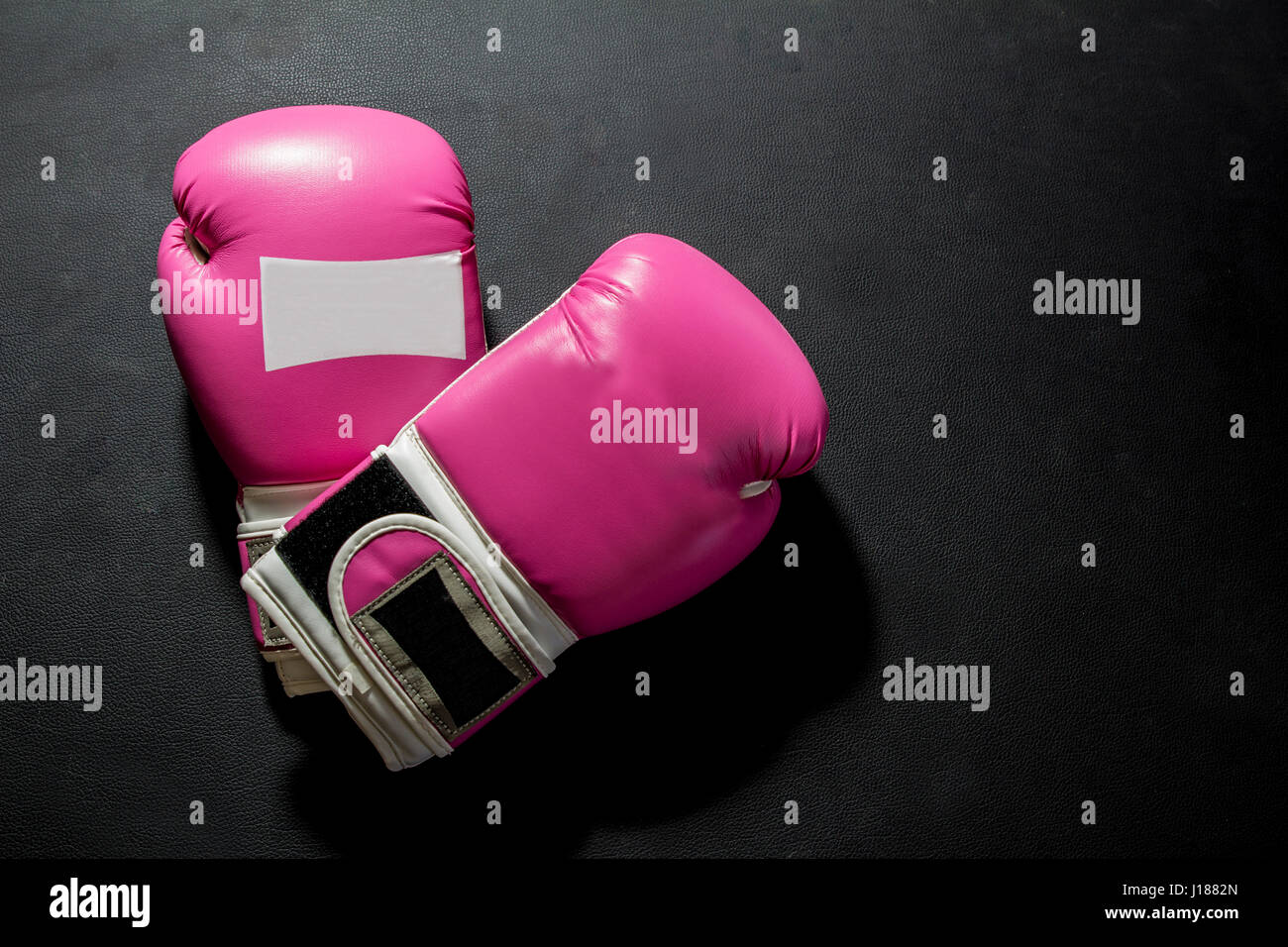 pink boxing gloves isolated Stock Photo - Alamy