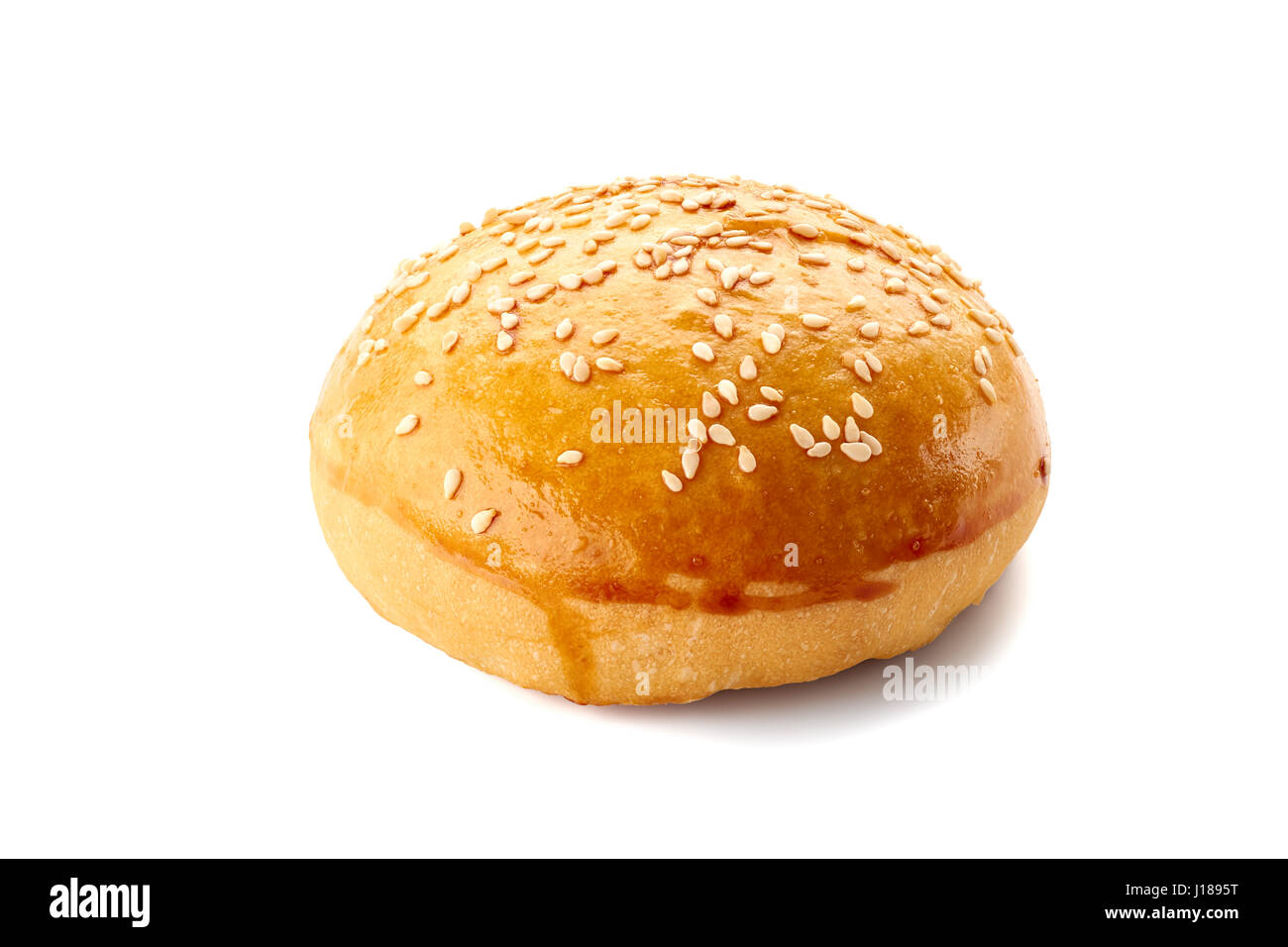 Homemade burger bun on white Stock Photo
