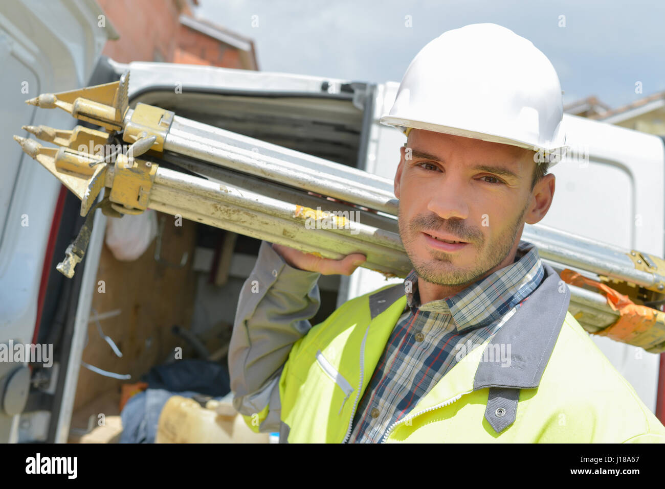 Surveyor arriving on site Stock Photo Alamy