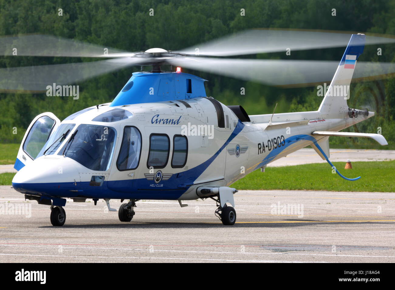 VLADIMIR, RUSSIA - JUNE 2, 2015: Private Agusta A109S Grand helicopter RA-01903 standing at Semyazino airfiled. Stock Photo