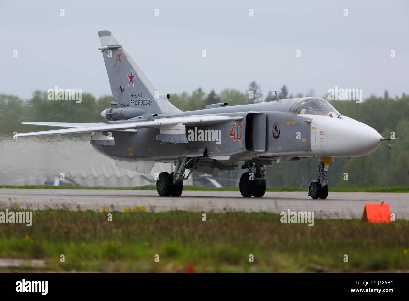 KUBINKA, MOSCOW REGION, RUSSIA - MAY 18, 2015: Sukhoi SU-24 RF-92245 bomber of Russian Air Force taxiing at Kubinka air force base. Stock Photo