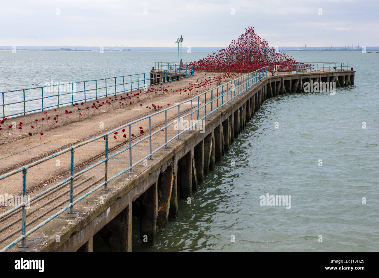 SOUTHEND-ON-SEA, UK - APRIL 16TH 2017:  The Poppy Wave installation by Paul Cummins and Tom Piper on Barge Pier in Shoeburyness, Southend-On-Sea, on 1 Stock Photo