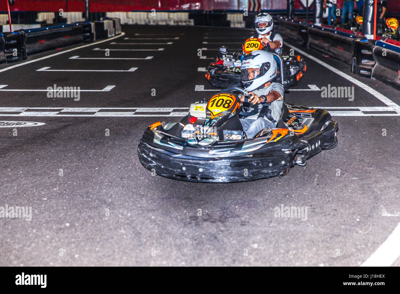 boy driving a kart inside the Karting Indoor circuit in Santa Cruz de