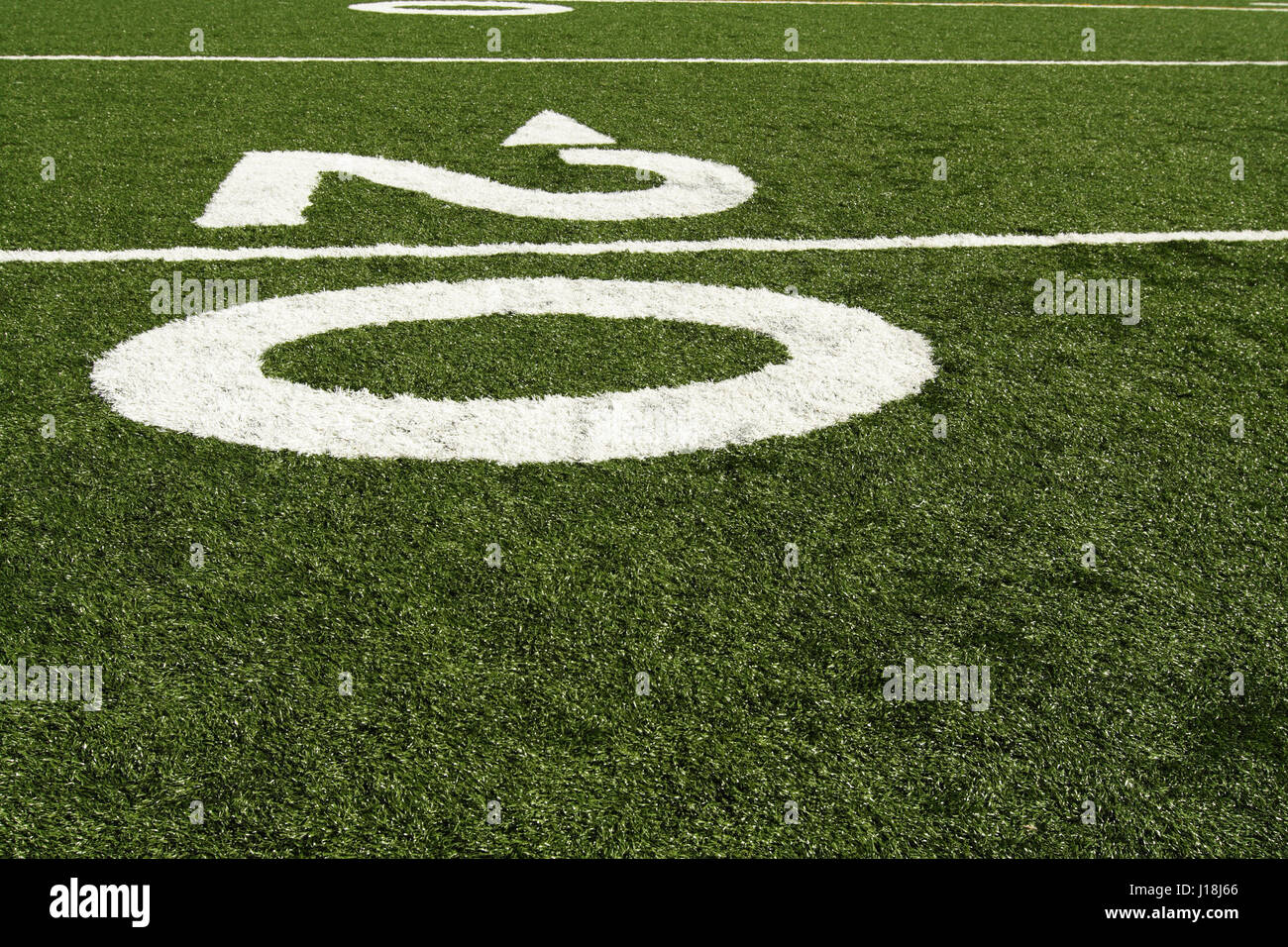 Twenty yard line of american football field Stock Photo Alamy