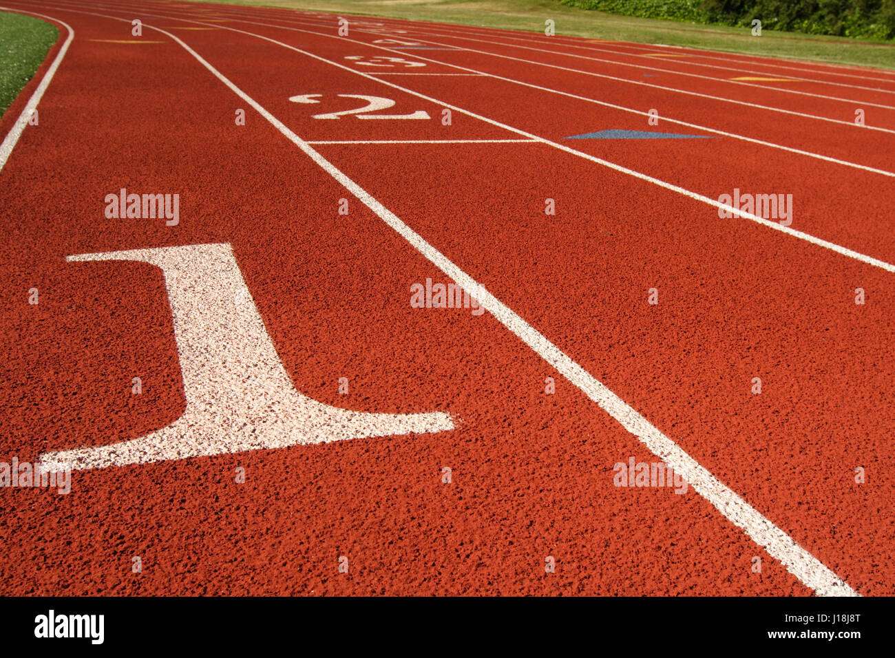 Start line in a running track Stock Photo - Alamy