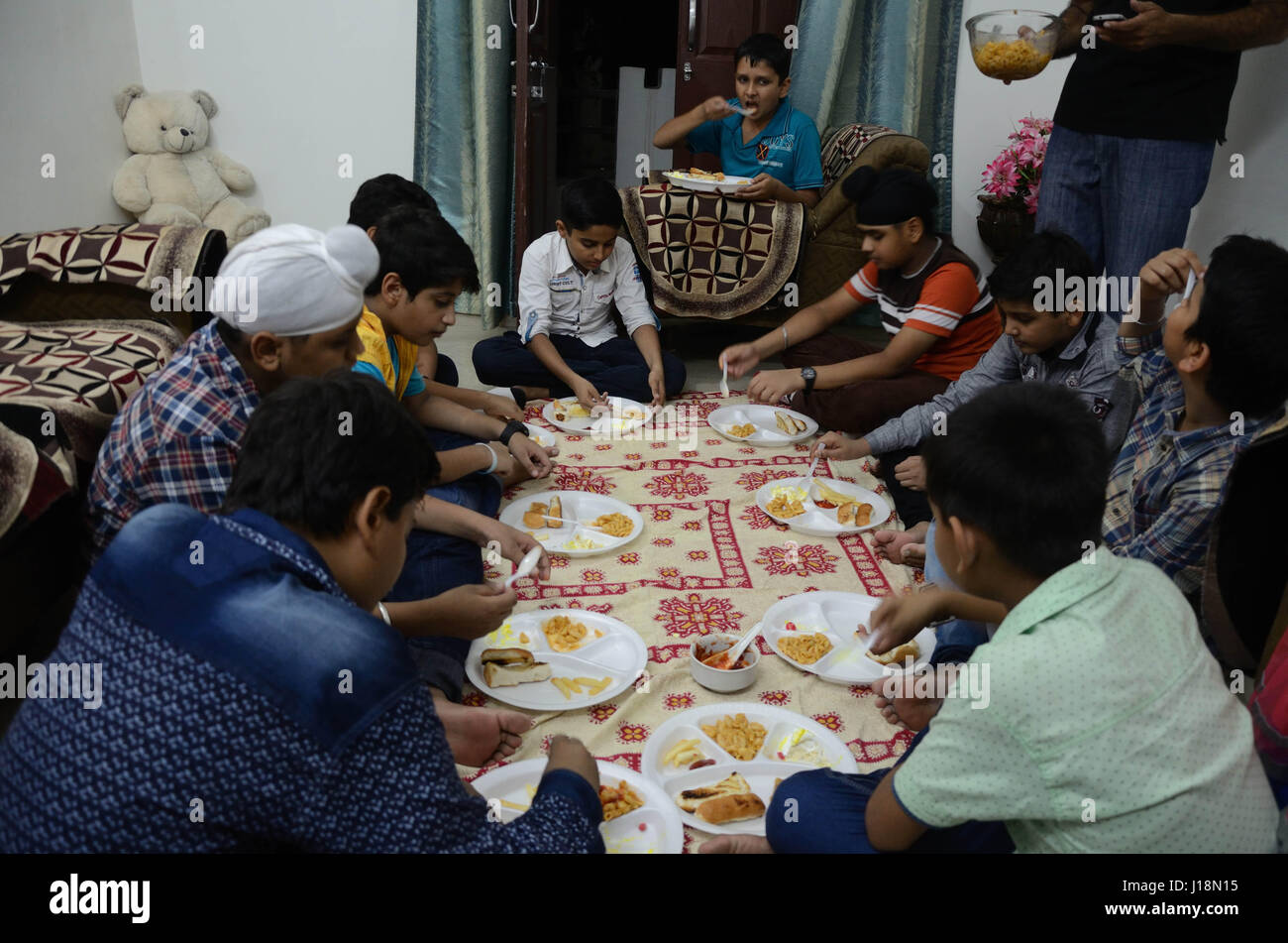 Indian child eating food hi-res stock photography and images - Alamy