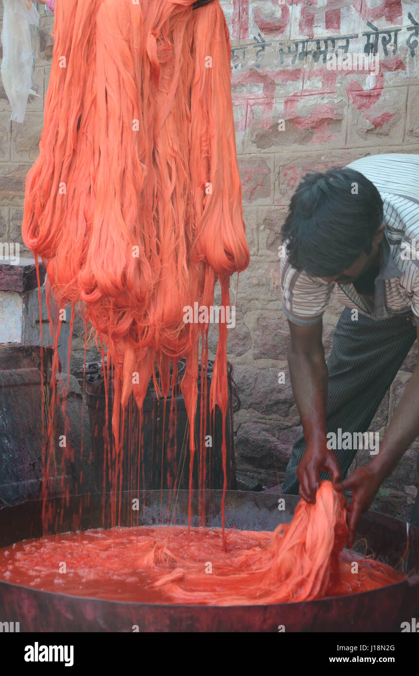 Man dyeing silky thread, jodhpur, rajasthan, india, asia Stock Photo