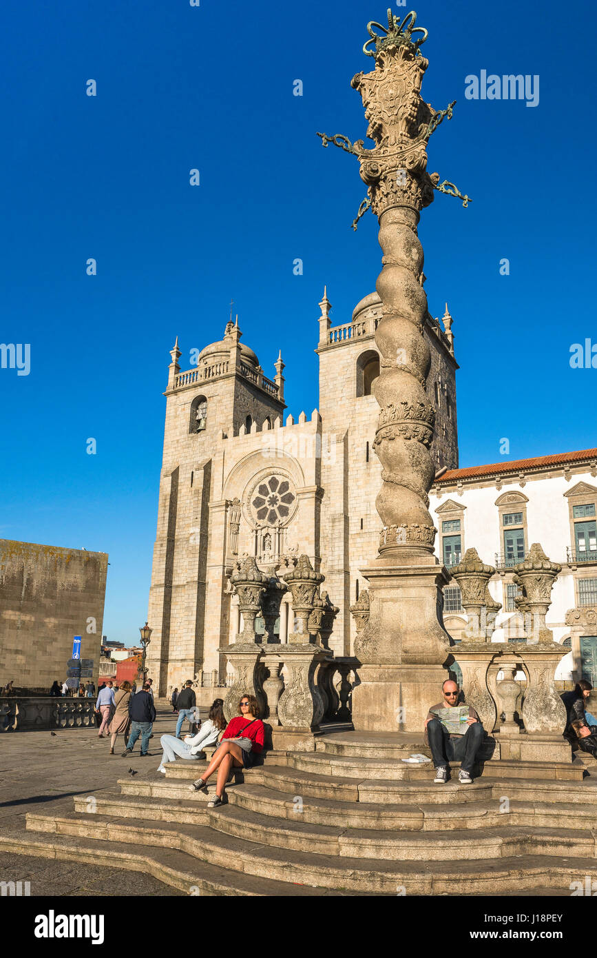 Porto Portugal, tourists relax on the grand terrace at the south end of Porto Cathedral, known as the Se, Oporto, Portugal, Europe. Stock Photo