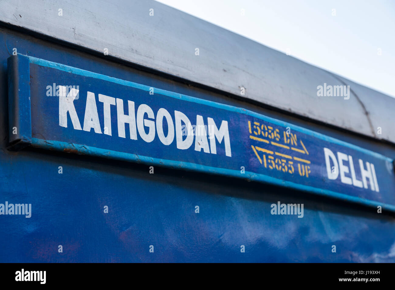 Destination plate sign on the outside of a blue railway carriage, Kathgodam Station, Nainital District, Uttarakand, northern India, Kathgodam to Delhi Stock Photo