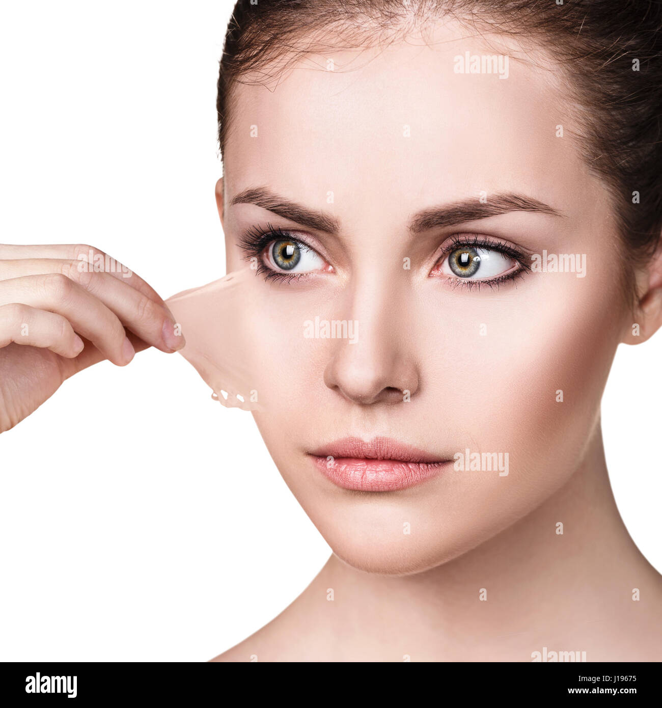 Woman remove her old dry skin from face. Stock Photo