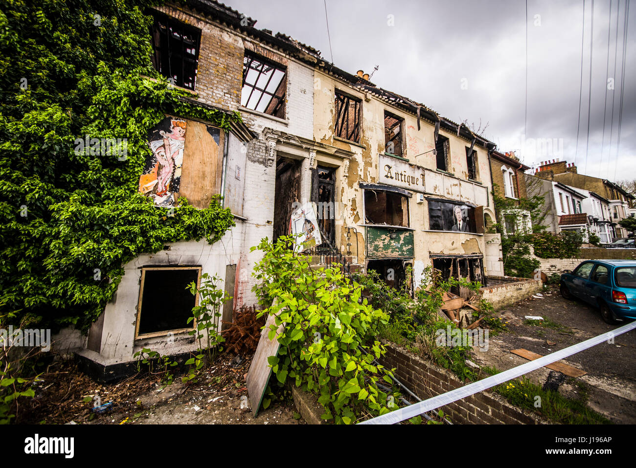 Derelict buildings in Southchurch Avenue after a fire gutted their insides, which is being treated as arson.The land is owned by Inner London Group Stock Photo