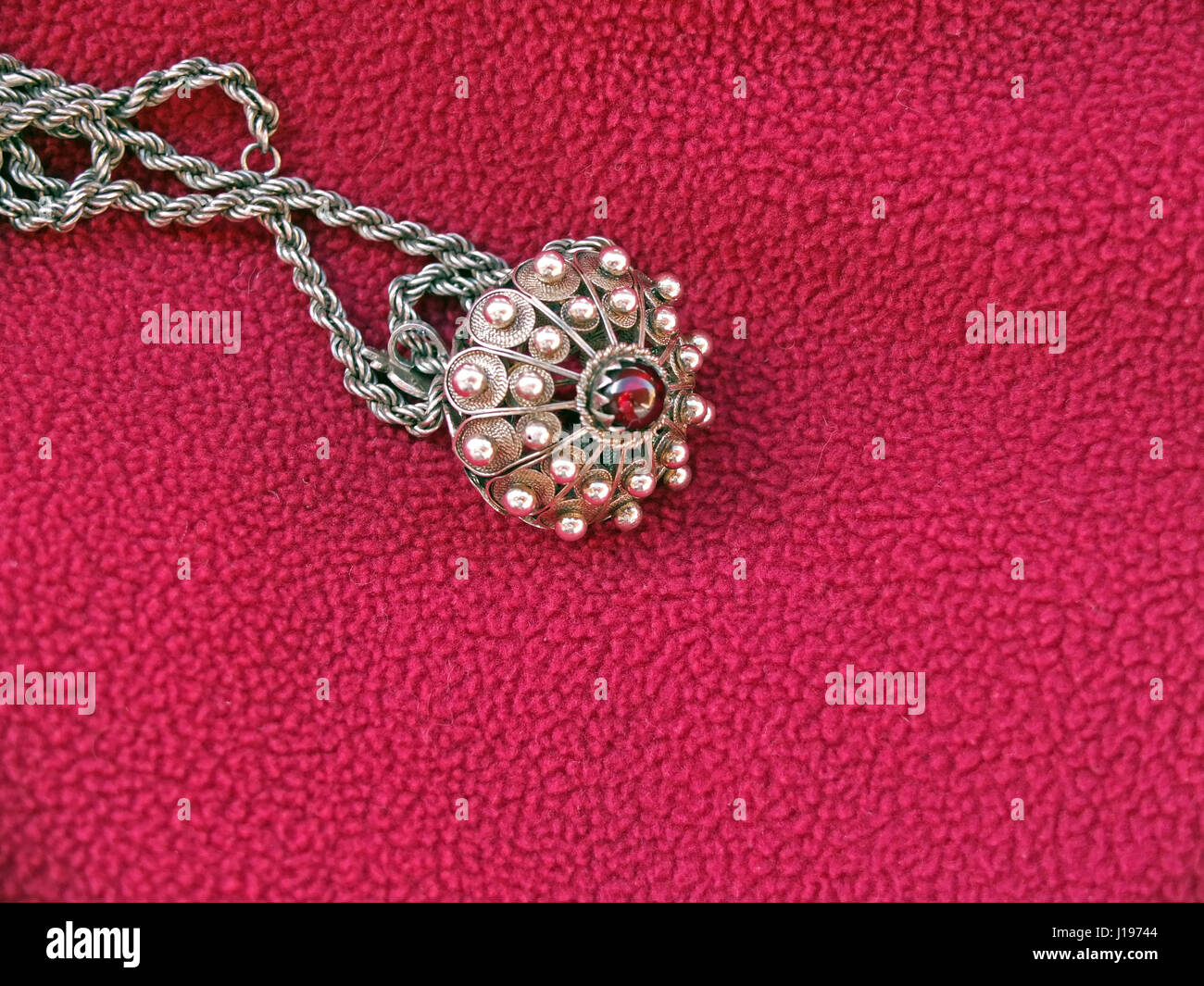 Sardinian jeweller's craft, silver button with collar Stock Photo