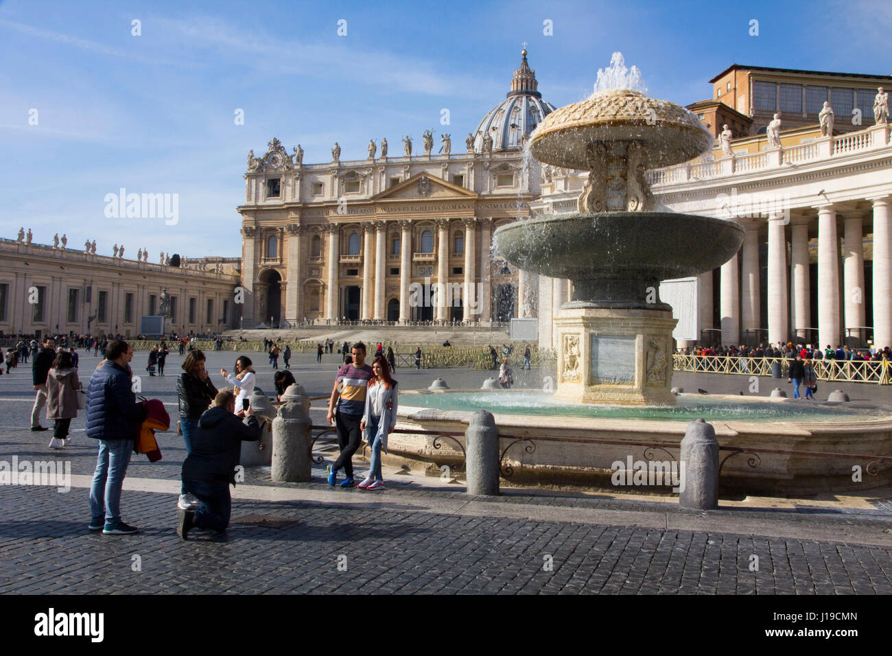 St. Peter's Square and Basilica in Vatican City, the papal enclave in Rome, Italy Stock Photo 