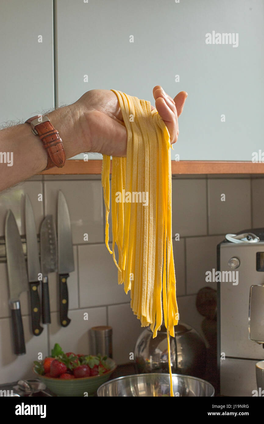 Making pasta at home with pasta machine Stock Photo Alamy