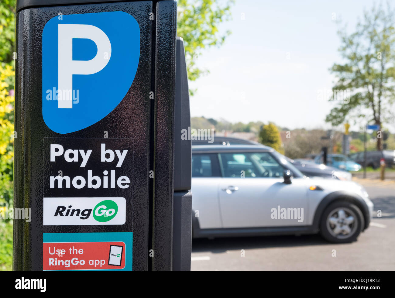 Ringgo parking sign in a car park , to pay for car parking with a mobile phone Stock Photo