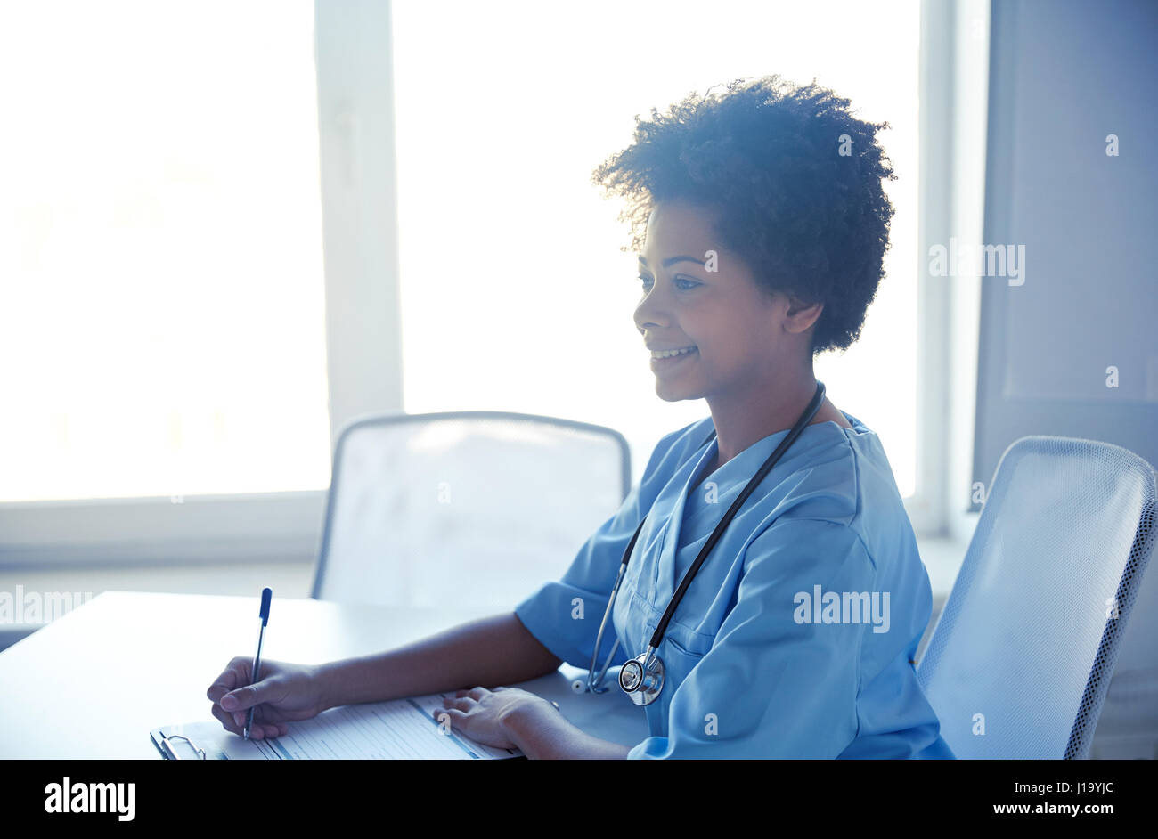 Black female doctor office hi-res stock photography and images - Alamy