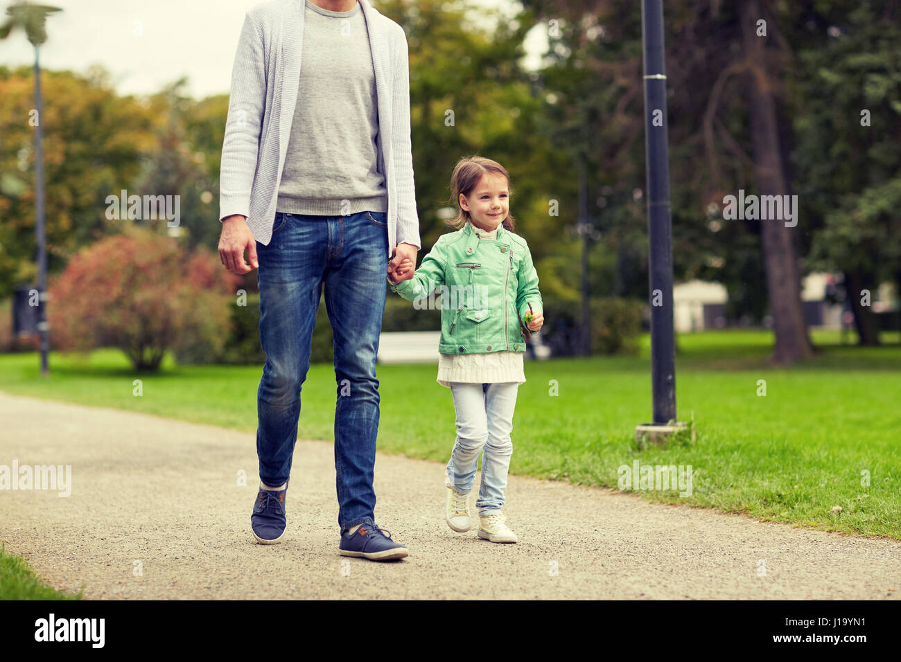 happy family walking in summer park Stock Photo - Alamy