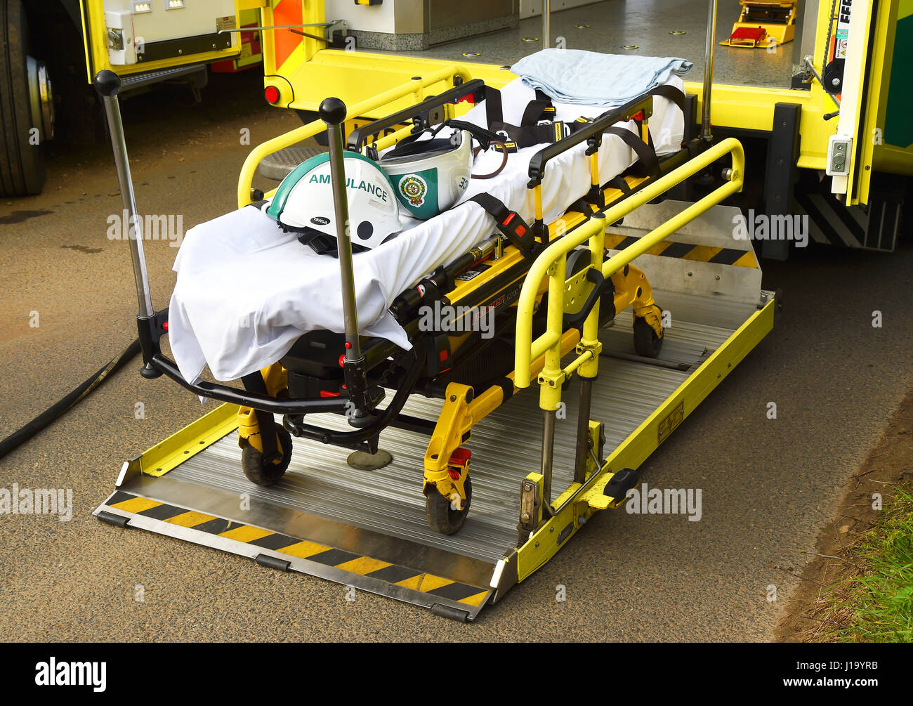 Ambulance gurney stretcher at road accident Stock Photo Alamy
