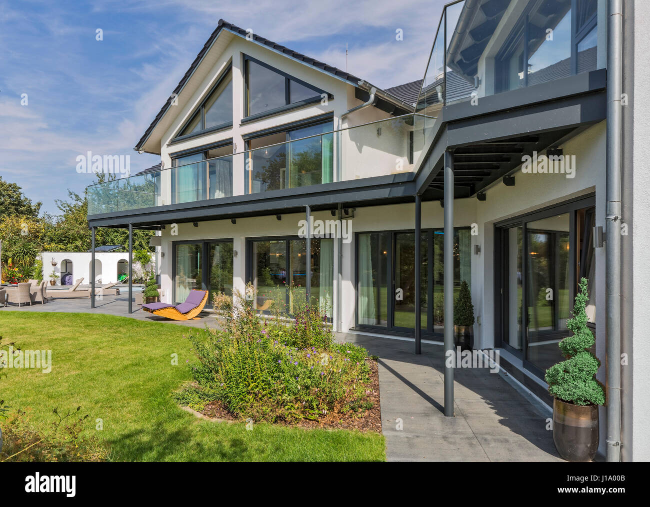 Rear elevation from garden. Weberhaus - Modular House, NA, United Kingdom. Architect: Weberhaus, 2017. Stock Photo