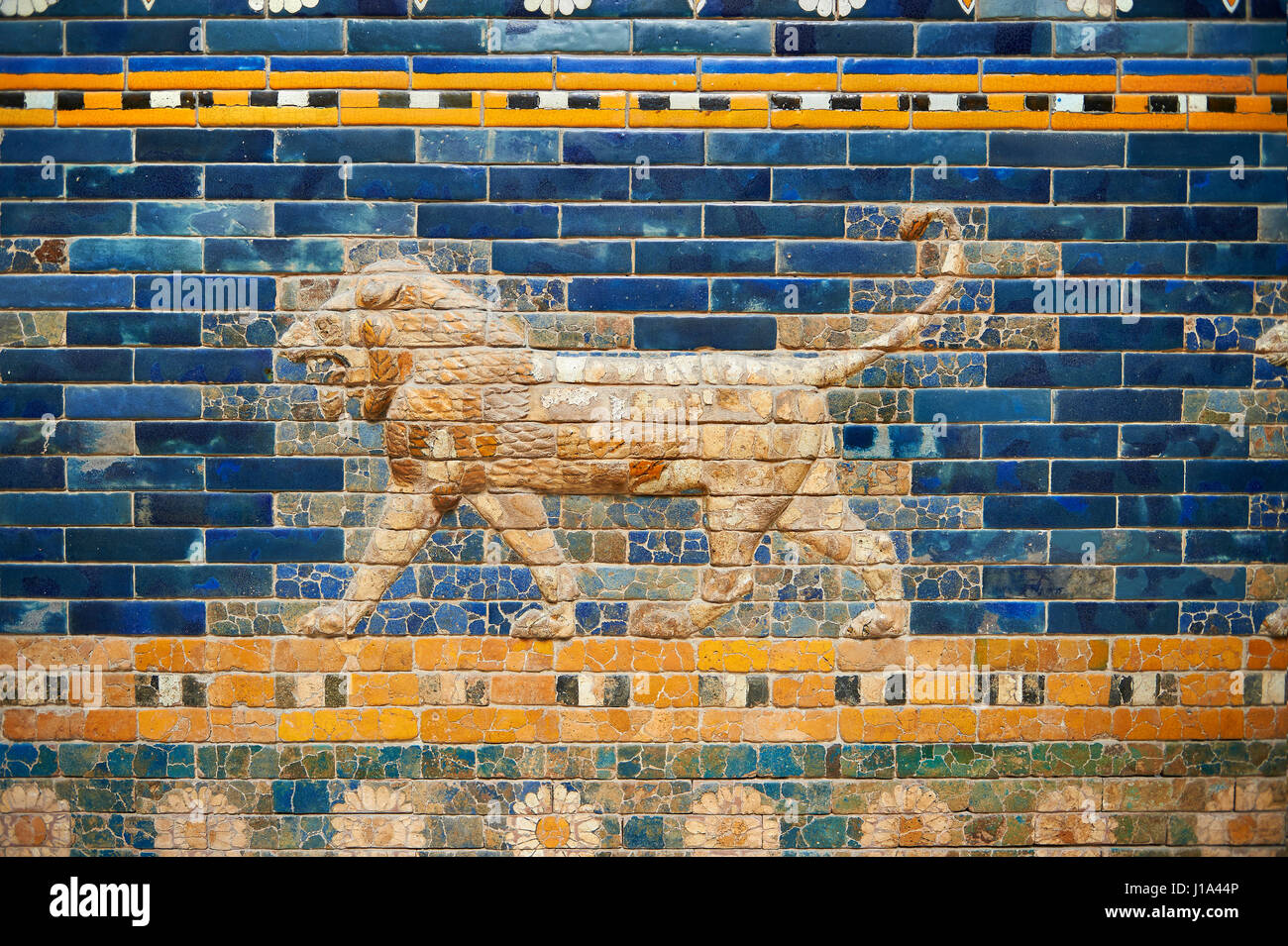 Coloured glazed brick panels depicting Lions stiding from the facade of the Throne Room dating from 604-562 BC. Babylon (present day Iraq). The throne Stock Photo