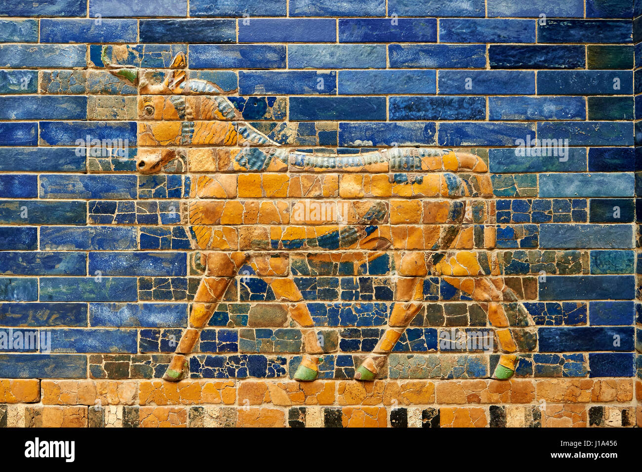 Coloured glazed brick panels of the facade of the  first smaller Ishtar Gate, Babylon, dating from 604-562 BC. Babylon (present day Iraq). The Ishtar  Stock Photo