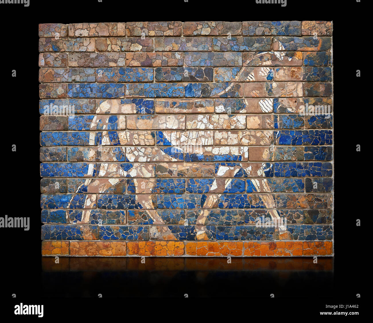 Coloured glazed brick panels depicting bulls, the symbol of the weather god Adad, from the facade of the  first smaller Ishtar Gate, Babylon, dating f Stock Photo