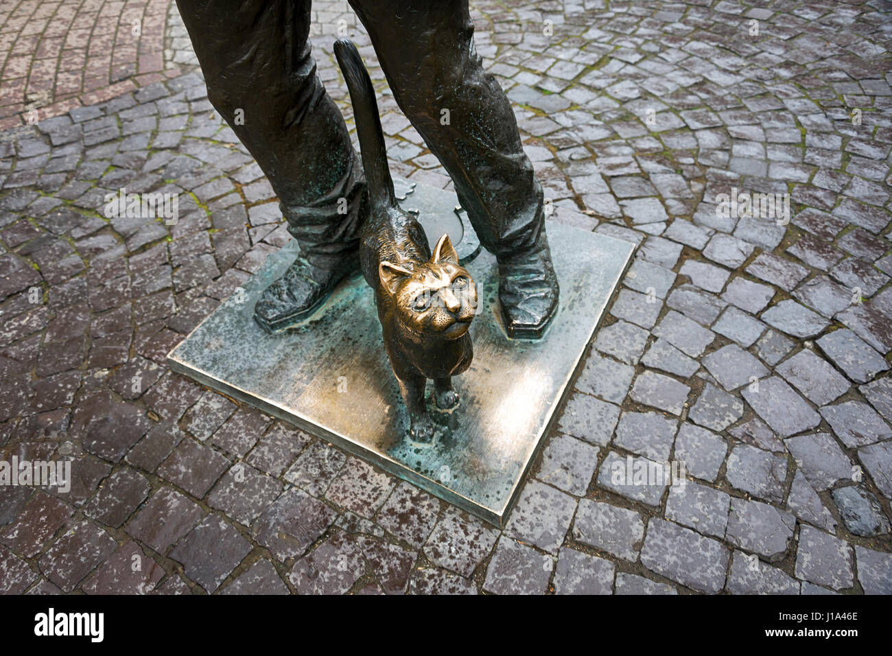 Monument of Happy Chimney Sweeper and his cat. The monument with real chimney sweeper Bertalon Tovt as prototype was unveiled on June 12, 2010 by Ukrainian sculptor Ivan Brovdi. Stock Photo