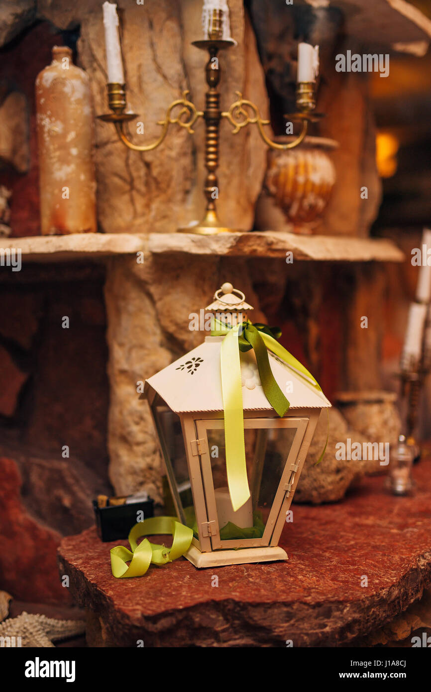 Wax candle in a white lantern Stock Photo Alamy