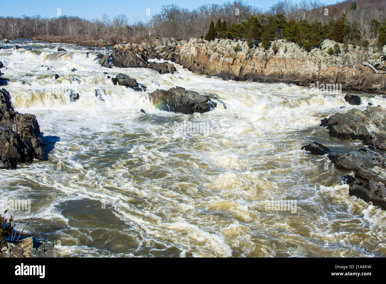 White Cliffs Water Rushing rushing white water in great falls park, virginia side in winter Stock ...