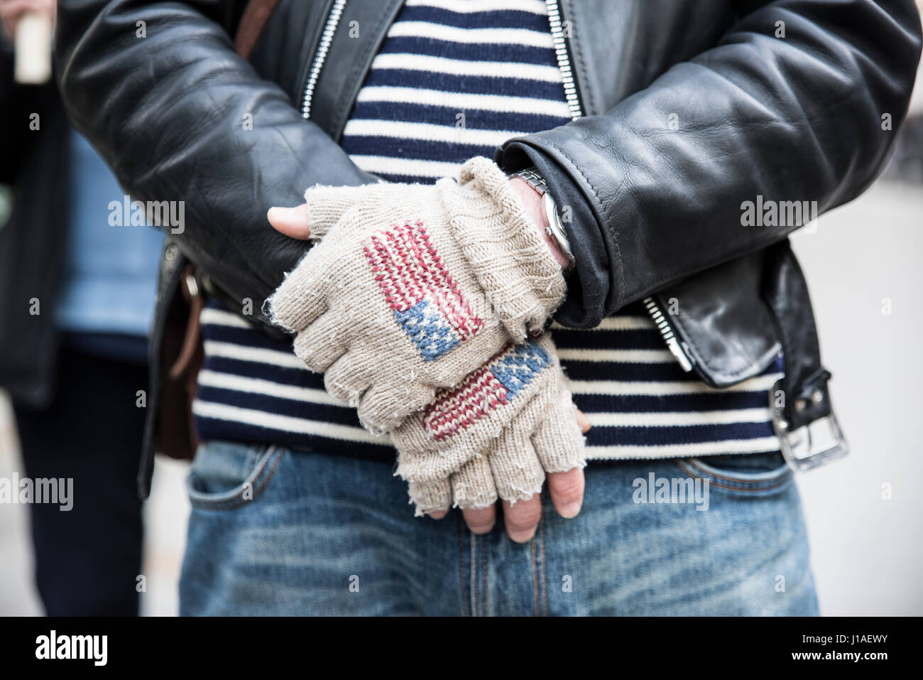 London, UK. 19th Apr, 2017.  A man is listening to the speeches at the protest against Trump's policies on the 19th of April, 2017 at the US Embassy, Grosvenor Square, London Credit: Anja Riedmann/Alamy Live News Stock Photo