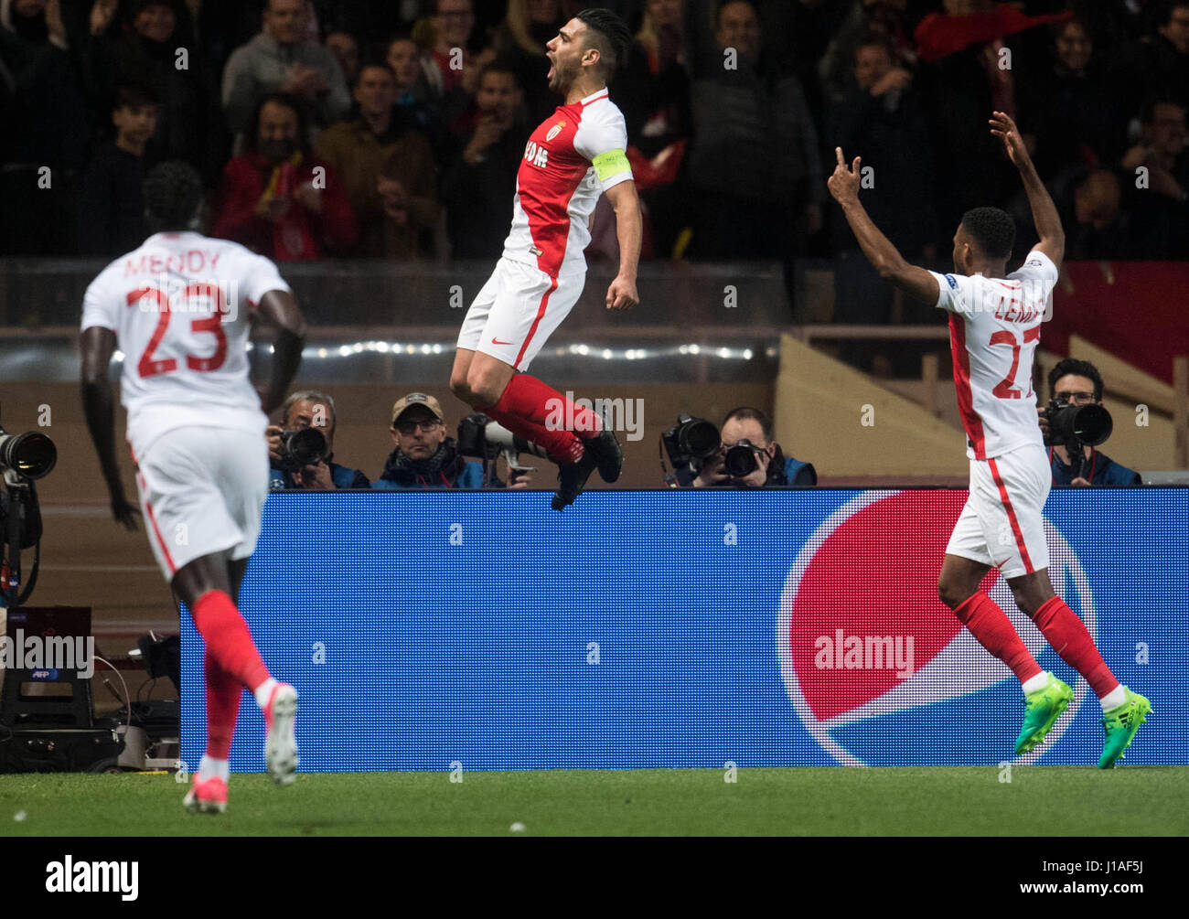 Monaco, Monaco. 19th Apr, 2017. AS Monaco's Radamel Falcao (M) celebrates with Thomas Lemar (R) and Benjamin Mendy after Monaco's goal bringing the score to 2:0 during the UEFA Champions League quarter final 2nd-leg soccer match between AS Monaco and Borussia Dortmund in the Stade Louis II in Monaco, 19 April 2017. Photo: Bernd Thissen/dpa/Alamy Live News Stock Photo