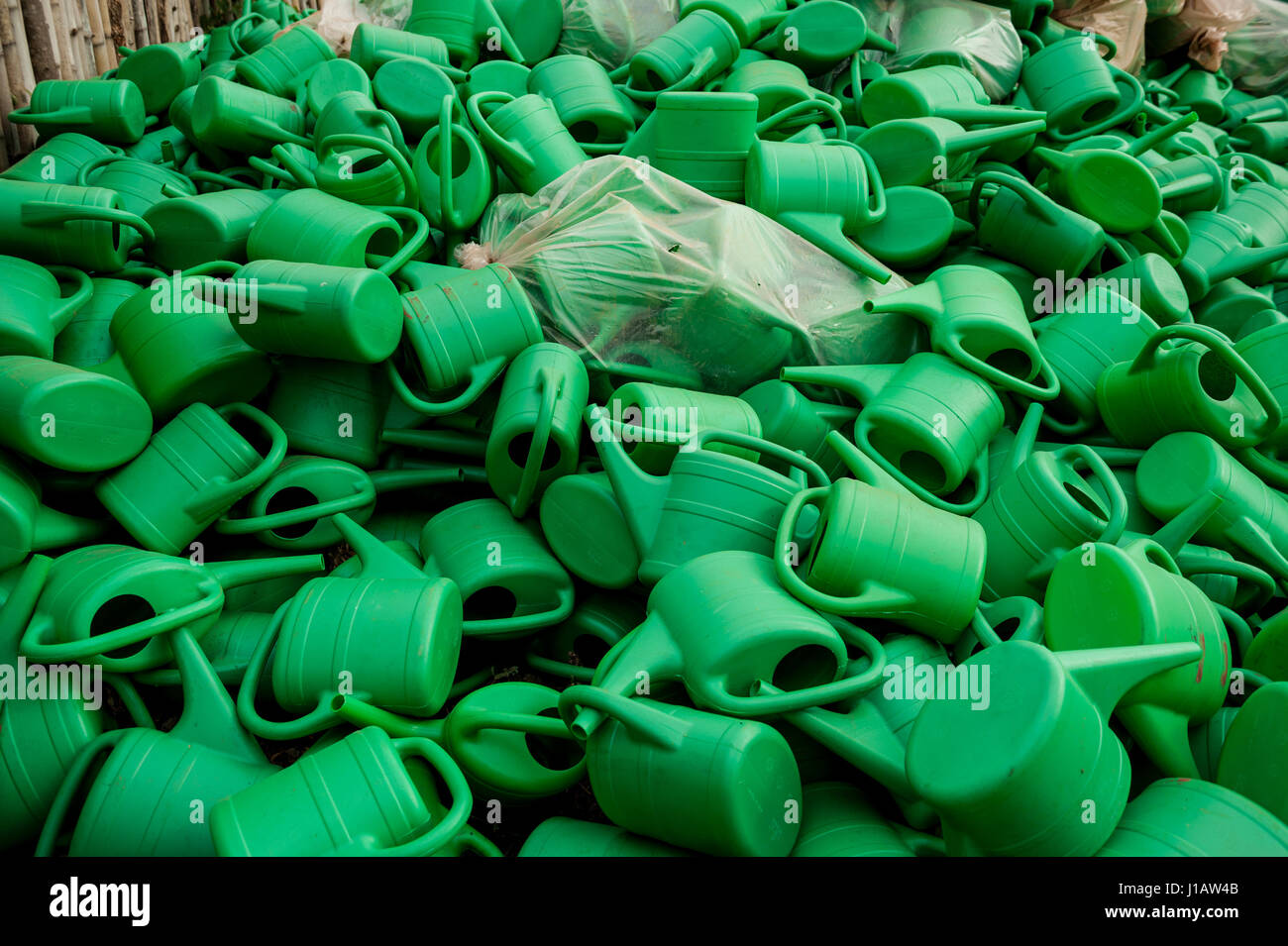 Watering cans from donors awaiting distribution to small-scale farmers in Faradje, north east Democratic Republic of Congo Stock Photo