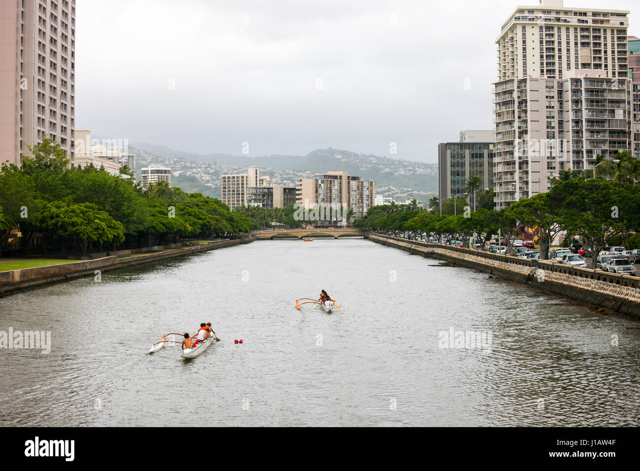 Kayak racing on Ala Wai Canal, north Waikiki, Hawaii Stock Photo