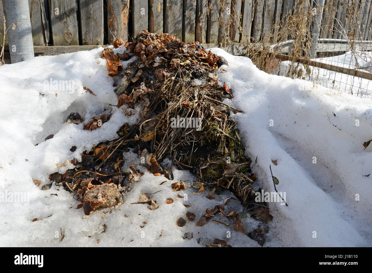 Compost heap in early spring Stock Photo