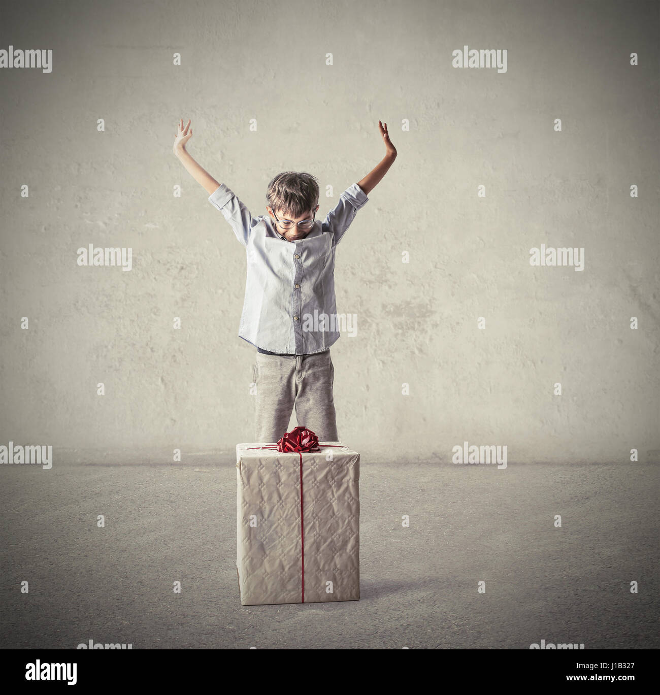 Boy being happy for gift Stock Photo