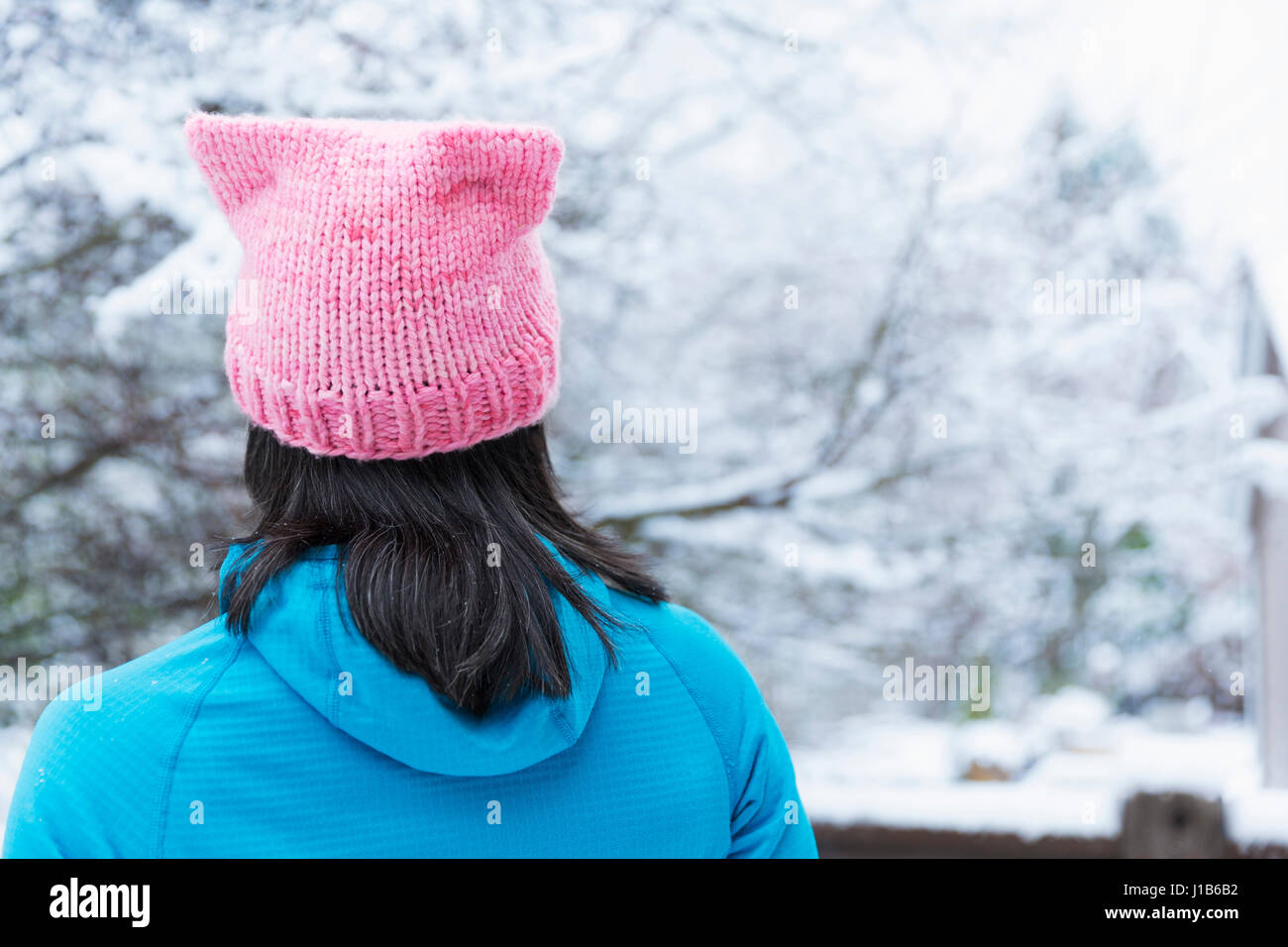 Japanese woman wearing pink hat with ears Stock Photo