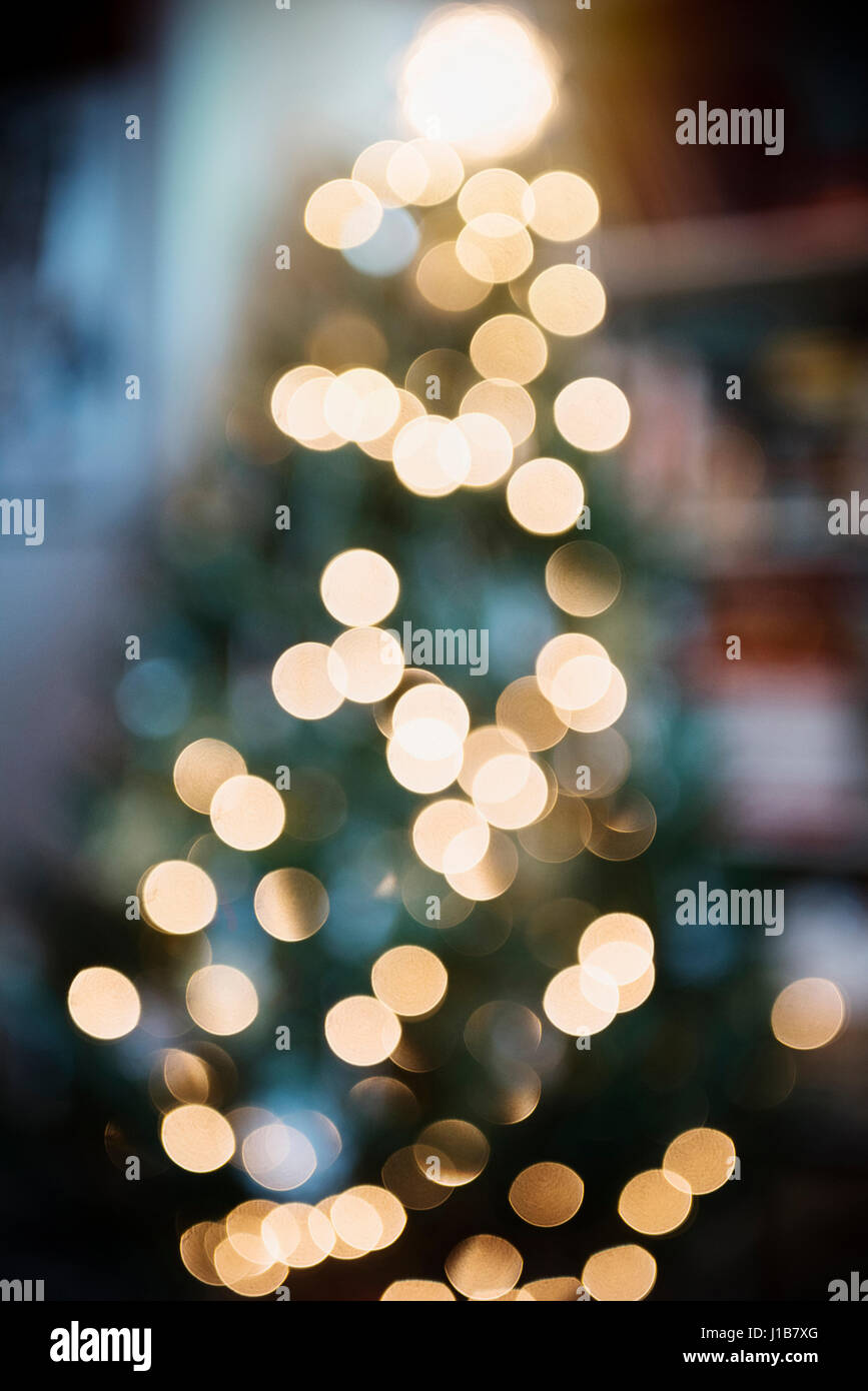 Defocused lights on Christmas tree Stock Photo