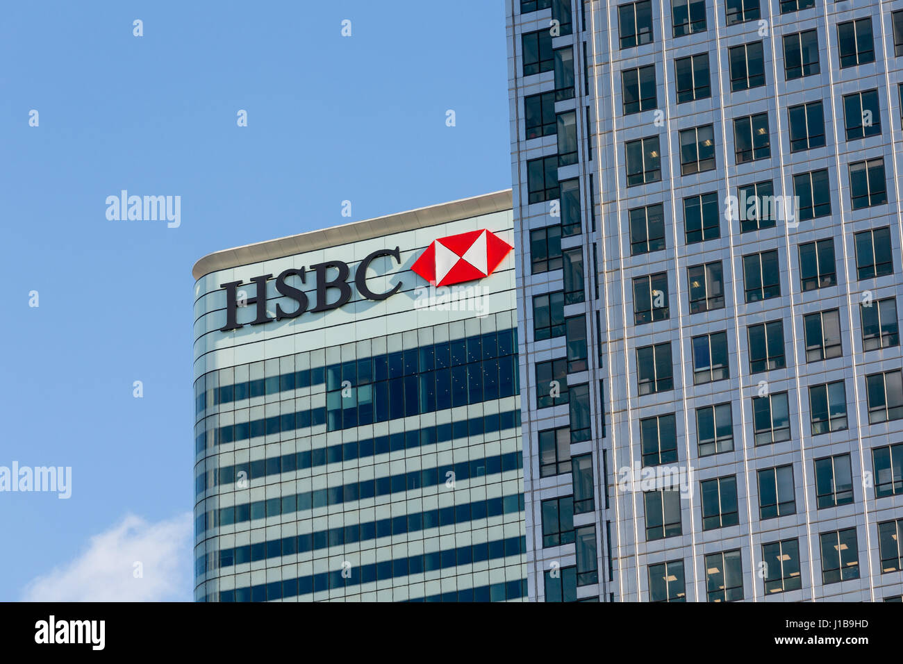 HSBC bank logo sign on the HSBC HQ office building in Canary Wharf, Docklands, London, England Stock Photo