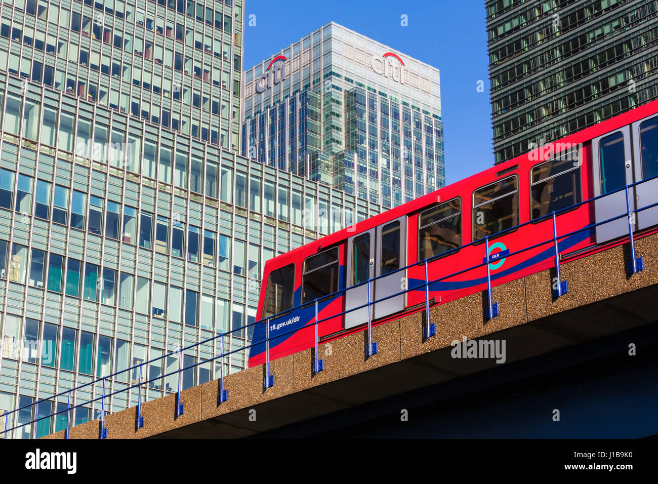 DLR Docklands Light Railway train in Canary Wharf, Docklands, London, England Stock Photo