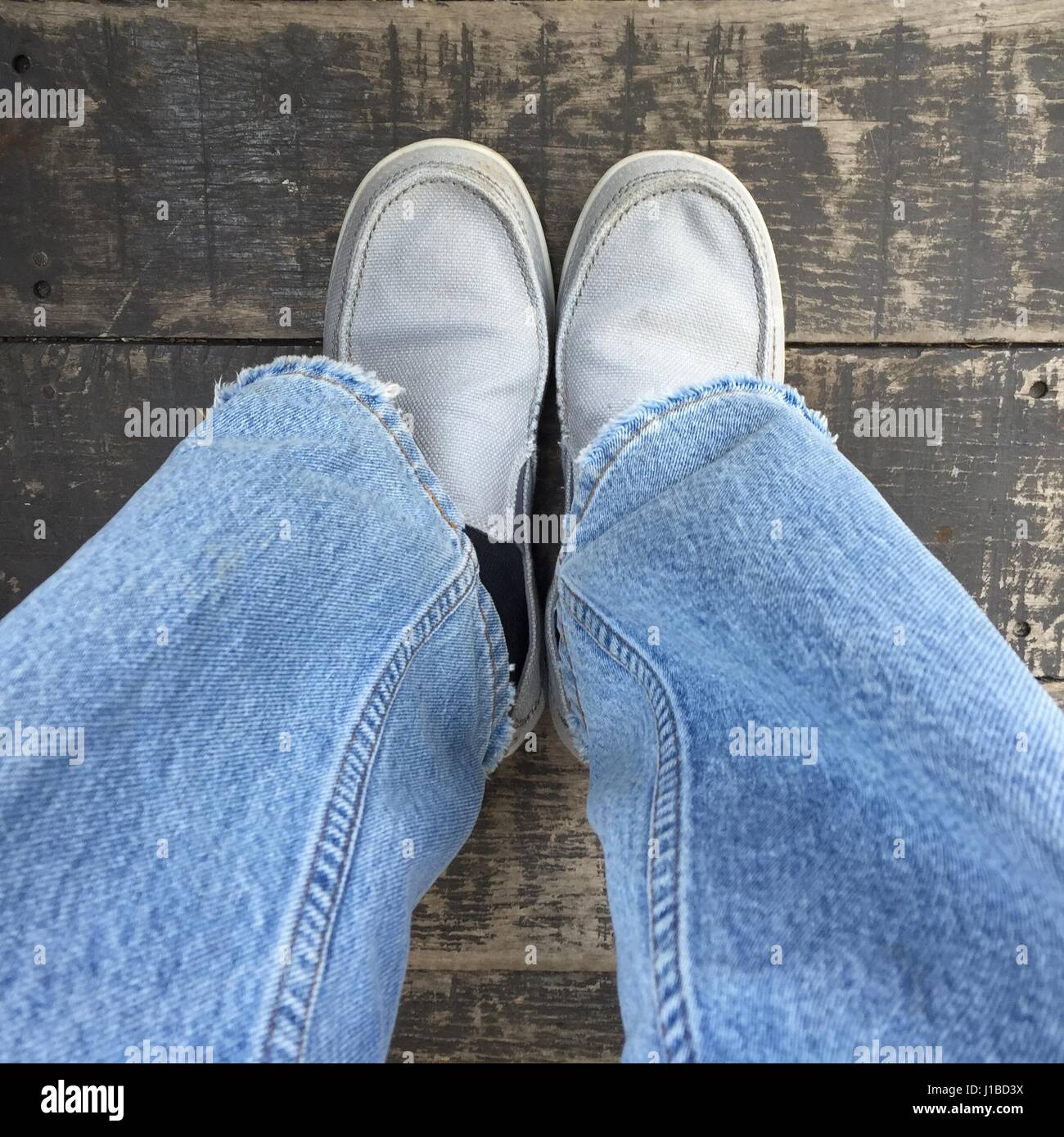 gray shoes blue pants