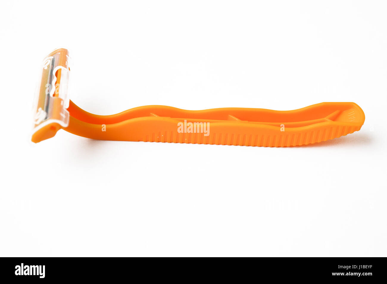 orange shaver isolated on white Stock Photo - Alamy
