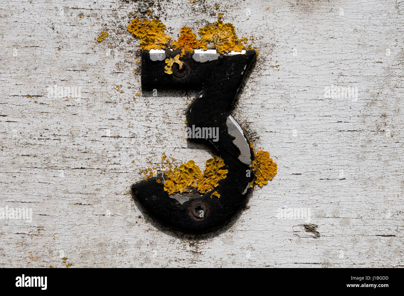 Number 3 on a road sign, Duns Tew, Oxfordshire, UK Stock Photo