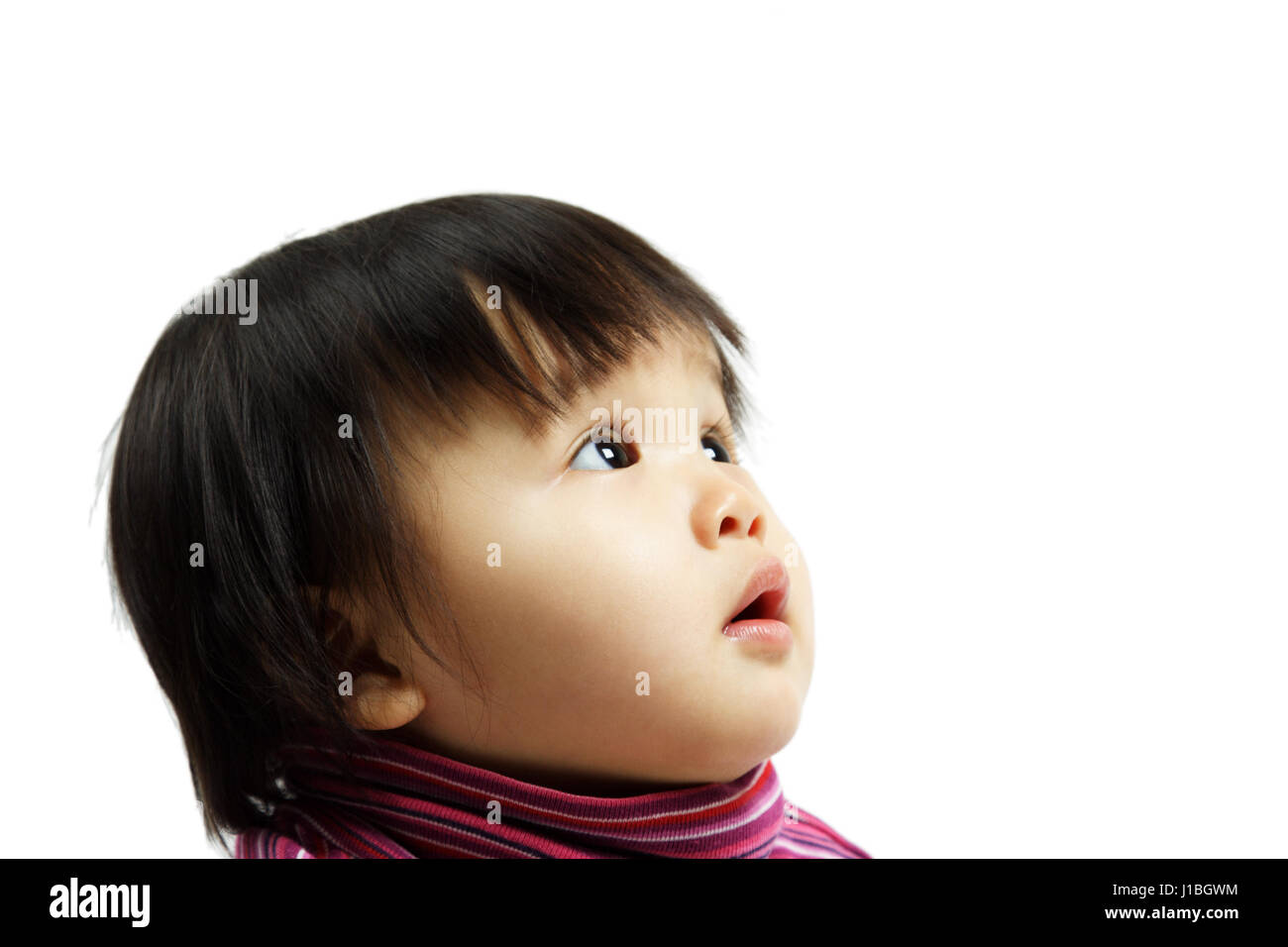 A cute baby girl looking up (isolated Stock Photo - Alamy