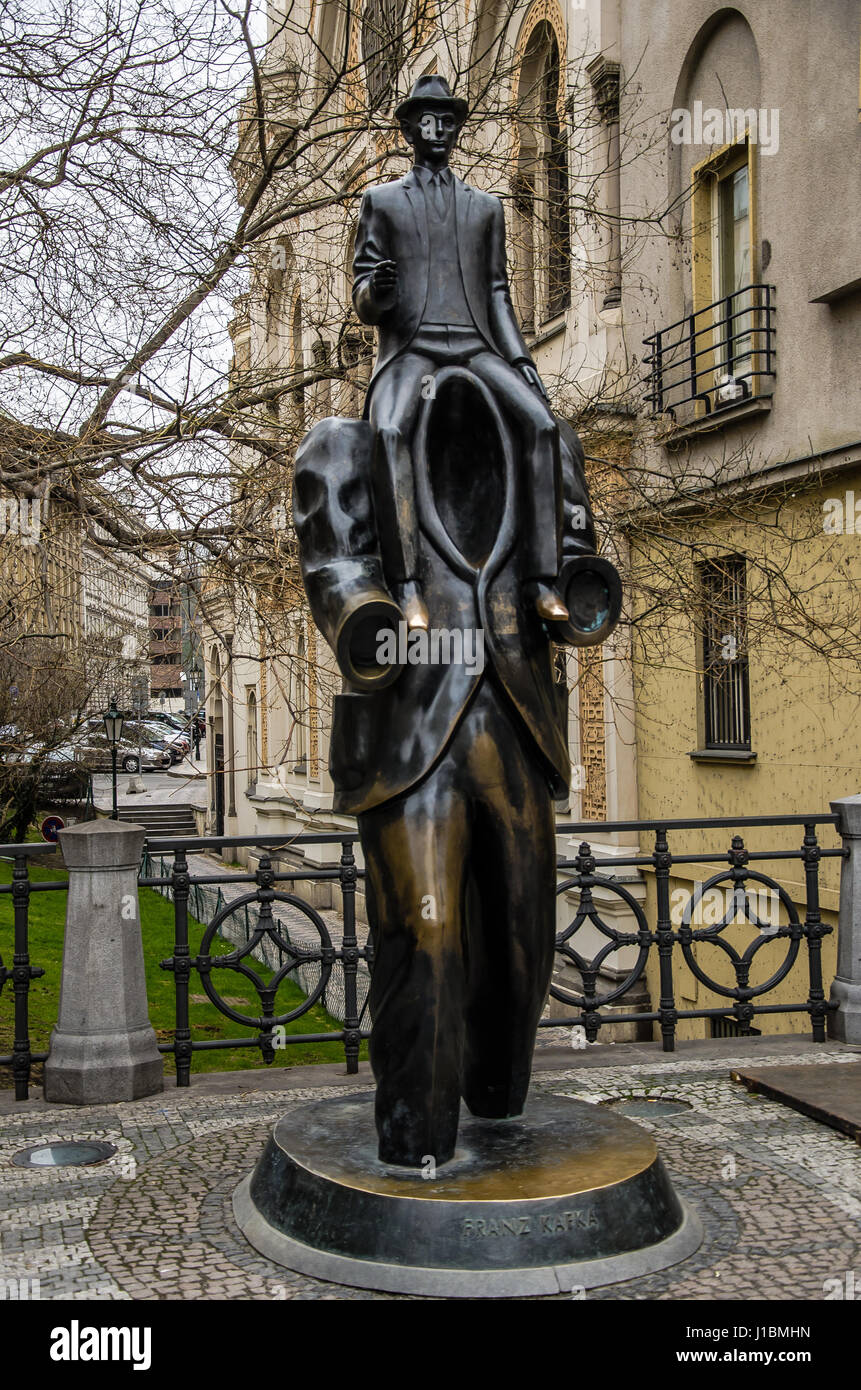 The statue of Franz Kafka is a sculpture by Jaroslav Róna, installed on Vězeňská street in Prague, based on a scene in Kafka's first novel, Amerika. Stock Photo
