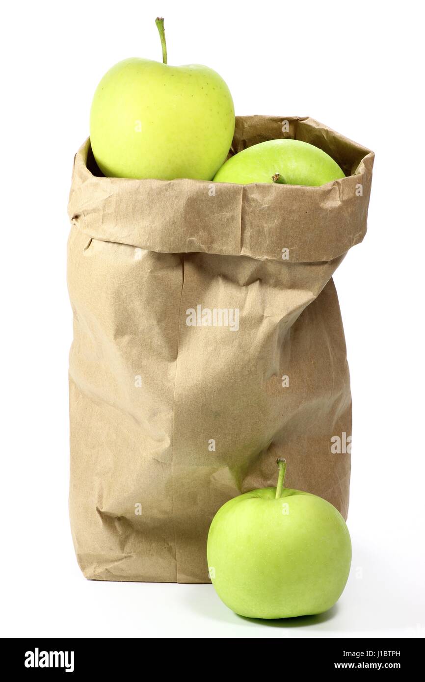 apples (variety Delcorf) in a paper bag isolated on white background