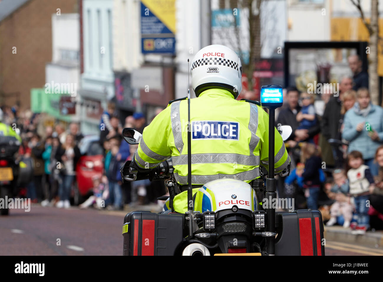 psni police officer traffic police on bmw motorbike during a parade in northern ireland Stock Photo