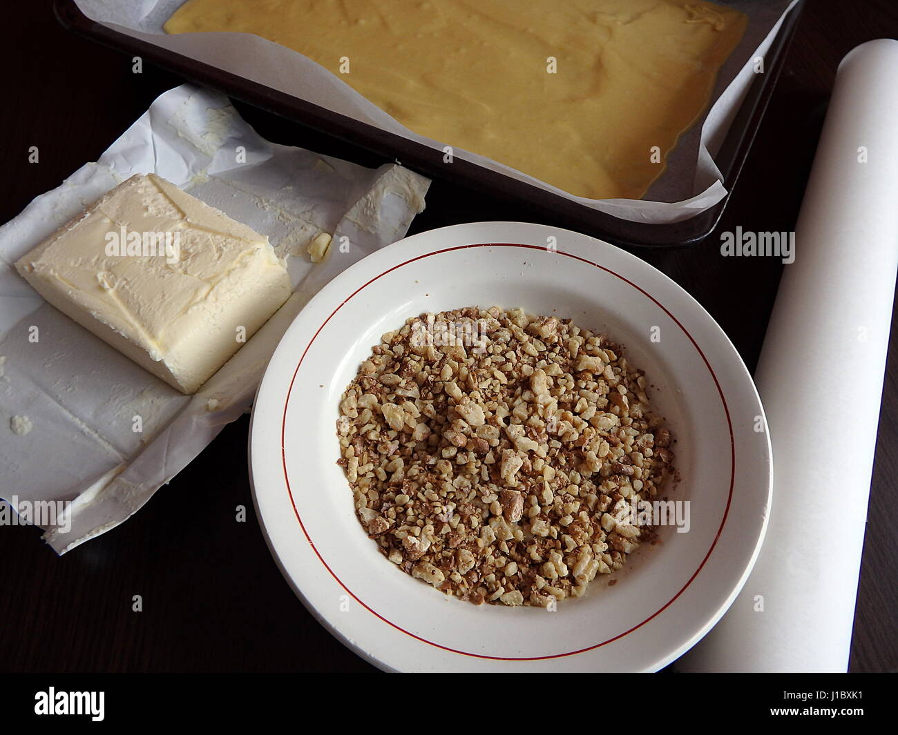 Crushed nuts, butter and dough, baking cakes Stock Photo Alamy