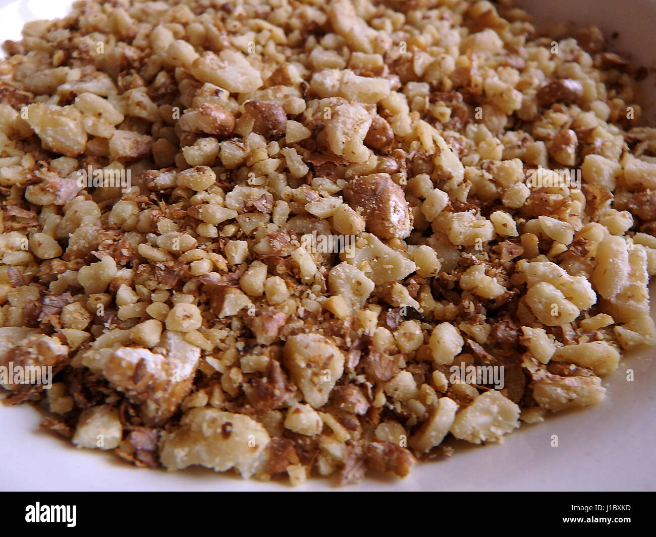 Crushed nuts, walnut Stock Photo Alamy