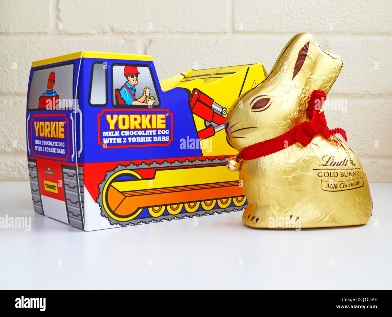A Yorkie Easter Egg and Lindt milk chocolate gold bunny bought as presents at Easter. Stock Photo