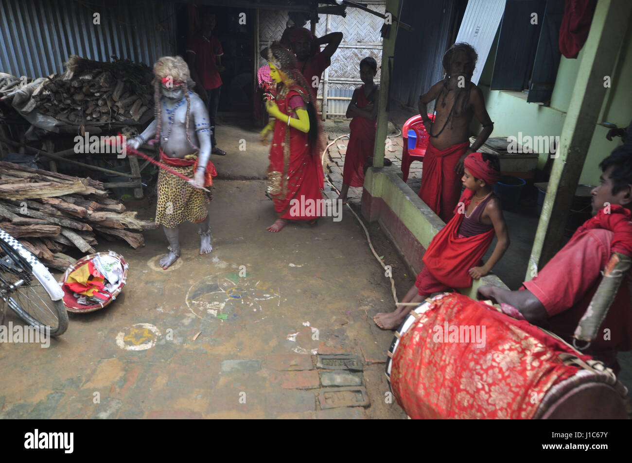 'Shiber Gajan', a traditional festival of the Hindu community -  06/04/2017  -  India / Tripura / Agartala  -  INDIA,TRIPURA-APRIL 6:Folk artists  are busy in dancing with the make-up of God Shiv and Godess Gouri,  ahead of 'Shiber Gajan', a traditional festival of the Hindu community in the outskirts of Agartala city in Tripura. In Bengal and areas having Bengali speaking populace, Gajan is a unique festival celebrated in the last two days Chaitra which marks the end of the Bengali New Year. The festival usually starts in mid April. Though Gajan is primarily a festival of the farming communit Stock Photo